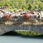 © Bonneval sur Arc, summer, entrance to the village by the stone bridge - Pascal Cariou